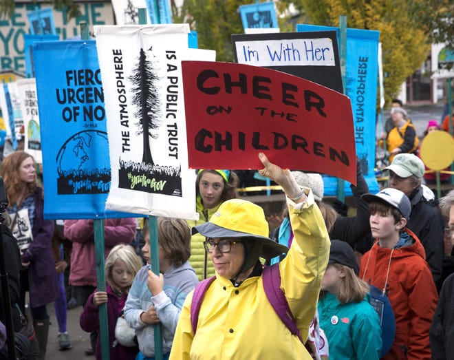Supporters of the youth plaintiffs in Juliana vs. United States rally at United States District Courthouse on what was supposed to be the first day of the climate change trial in Eugene, Ore., Monday, October 29, 2018. The Supreme Court issued a temporary stay in the case on October 19 delaying the trial indefinitely. [Andy Nelson/The Register-Guard] - registerguard.com