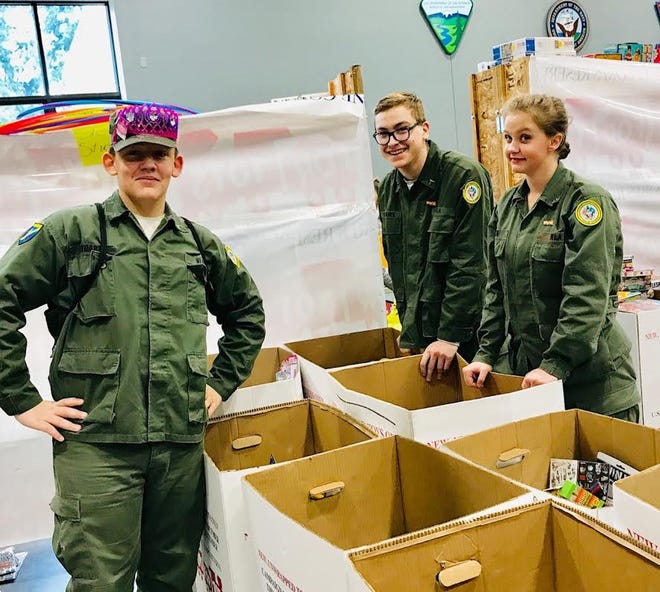 Students from the Willamette Leadership Academy High School spent their Saturday distributin toys for the Lane County Toys for Tots program. [Source: Kate Kontz, Willamette Leadership Academy]