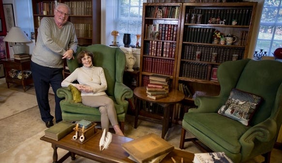 Daniel Ryan and his wife, Alice, with their Charles Dickens collection. [Submitted Photo]