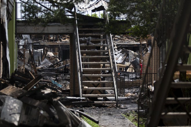 The interior courtyard of Building 500 at the Iconic Village Apartments in San Marcos on July 31. Five people died after a fire occurred at the complex July 20. [LYNDA M. GONZALEZ / AMERICAN-STATESMAN]