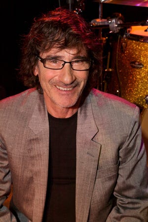 Beaver County's resident rock star Donnie Iris is among the regonal artists singing Christmas songs and other favorite tunes in a Wednesday concert at the Benedum Center in Pittsburgh. [Submitted]