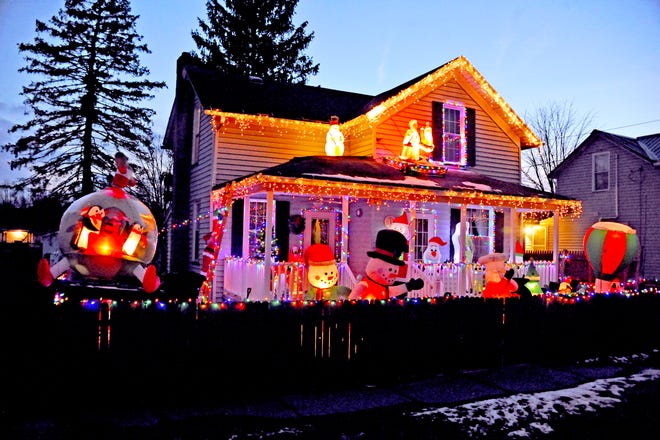 The home of David Holiday in Creston is lit up each night. Holiday decorates his home each year for friends and family to enjoy.