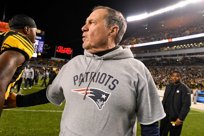 New England Patriots head coach Bill Belichick talks with Pittsburgh Steelers wide receiver Darrius Heyward-Bey, left, on the field following an NFL football game in Pittsburgh, Sunday, Dec. 16, 2018. (AP Photo/Don Wright)