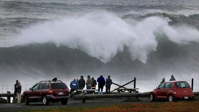 Large waves crash ashore at Duncan's Landing north of Bodega Bay, Calif., Monday, Dec. 17, 2018, as a large swell train arrive on the Sonoma Coast. (Kent Porter/The Press Democrat via AP)
