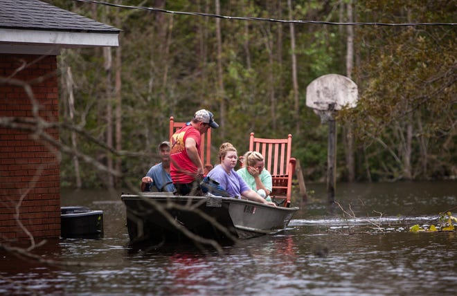 Few residences using private wells in North and South Carolina, Florida and Georgia have had the well water tested after flooding caused by hurricanes may have caused contamination. The Haddocks remove possessions from the ir flooded home Sept. 17 in Trenton, N.C. following Hurricane Florence. [Travis Long/Raleigh News & Observer]