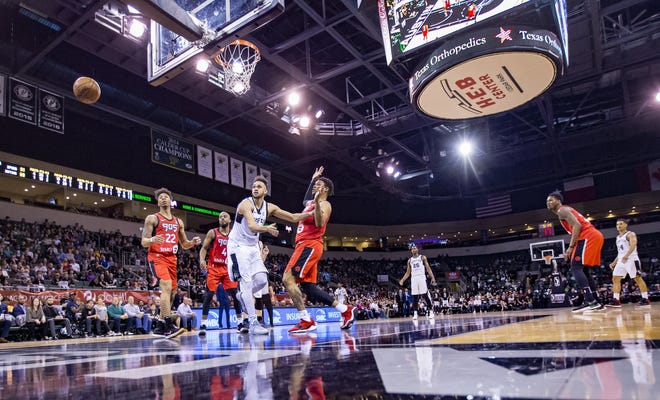 April 8, 2018, Cedar Park, TX; Austin Spurs guard Derrick White (4) shot is blocked by a Raptors 905 defender and flies out of bounds during the fourth quarter at the NBA-G Basketball Finals at HEB Center Cedar Park. [JOHN GUTIERREZ / FOR AMERICAN-STATESMAN]