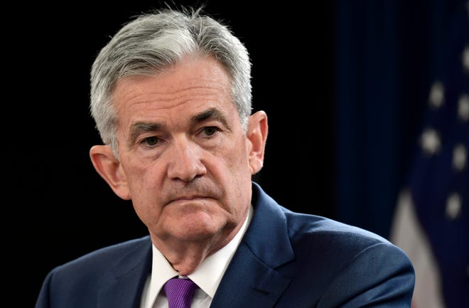 FILE- In this Sept. 26, 2018, file photo Federal Reserve Chairman Jerome Powell listens to a question during a news conference in Washington. The Federal Reserve is poised Wednesday, Dec. 19, to raise its key interest rate for the fourth time this year. But beyond that, its plans are shrouded in uncertainty. (AP Photo/Susan Walsh, File)