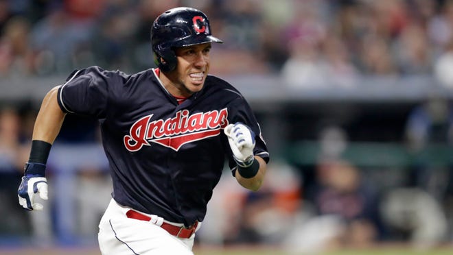 FILE - In this Sept. 19, 2018 file photo Cleveland Indians' Michael Brantley runs to first base on a passed ball in the third inning of a baseball game against the Chicago White Sox in Cleveland. A person familiar with the negotiations tells The Associated Press the Houston Astros have agreed to a two-year deal with free agent outfielder Michael Brantley. The person spoke on the condition of anonymity Monday, Dec. 17, 2018 because the club has not yet announced the move. (AP Photo/Tony Dejak, file)