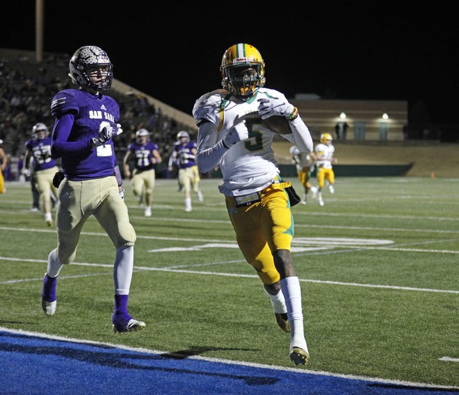 New Deal's DK Blaylock (5) runs the ball in to score a touchdown during the state semifinal game against San Saba, Friday, Dec. 14, 2018, at Shotwell Stadium in Abilene, Texas. [Brad Tollefson/A-J Media]