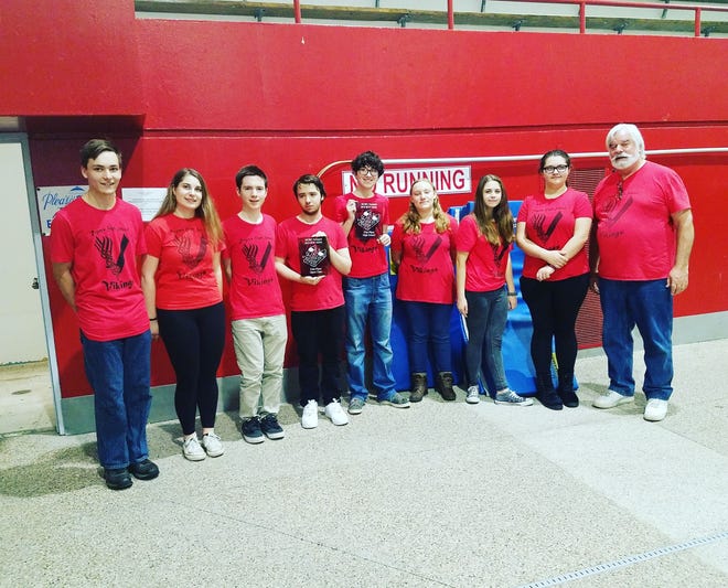 Rogers High School robotic team members outscored the competition at the Southeastern New England SeaPerch Derby on Saturday. From left are Joshua Pearson, Rose Kutsaftis, Nathan Murphy, Brandon Poling, Pierson Garcia, Brooklyn Wakefield, Elana Lahoud, Caroline Florence and Coach Scott Dickison. Owen Sibya is not pictured. [CONTRIBUTED PHOTO]