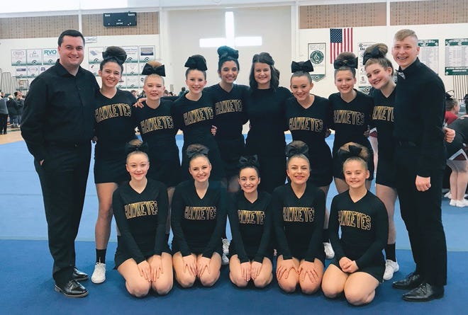 The Hamilton competitive cheer team took fourth at West Catholic and second at West Ottawa to start the season strong, despite having only one senior. [Courtesy/@CoachSinkler Twitter]