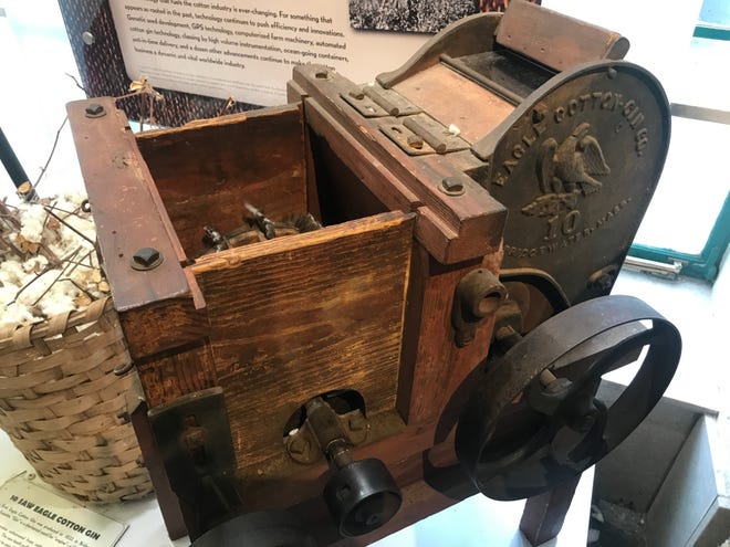 A cotton gin, manufactured in Massachusetts in 1833, on display at the Cotton Museum in Memphis. [Rick Holmes]