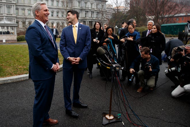 Speaker of the House Rep. Paul Ryan, R-Wis., right, and House Majority Leader Rep. Kevin McCarthy, R-Calif., speak to reporters after meeting with President Donald Trump on border wall funding at the White House on Thursday in Washington. [Evan Vucci/The Associated Press]