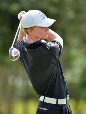 Danny Walker hits a tee shot during the Class 2A-District 13 boys golf tournament at the Founders Club in Sarasota, in 2012, while playing for Lakewood Ranch High. As a freshman, Walker won the Class 2A state tournament. [Herald-Tribune file photo / Mike Lang]