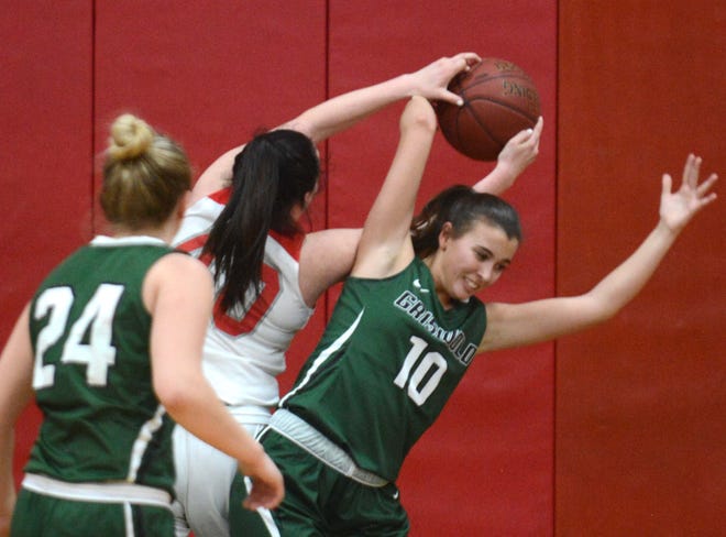 MONTVILLE 12-20-2018 AARON FLAUM: St. Bernard's Amber Caldwell and Griswold's Mandy Brohler go for the rebound during the first half at St. Bernard School on Thursday.

[Aaron Flaum/NorwichBulletin.com]