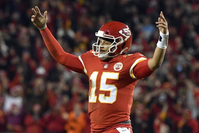 Kansas City Chiefs quarterback Patrick Mahomes leads the NFL in passing yards (4,543) and passing touchdowns (45) entering Week 16. [Ed Zurga/The Associated Press]