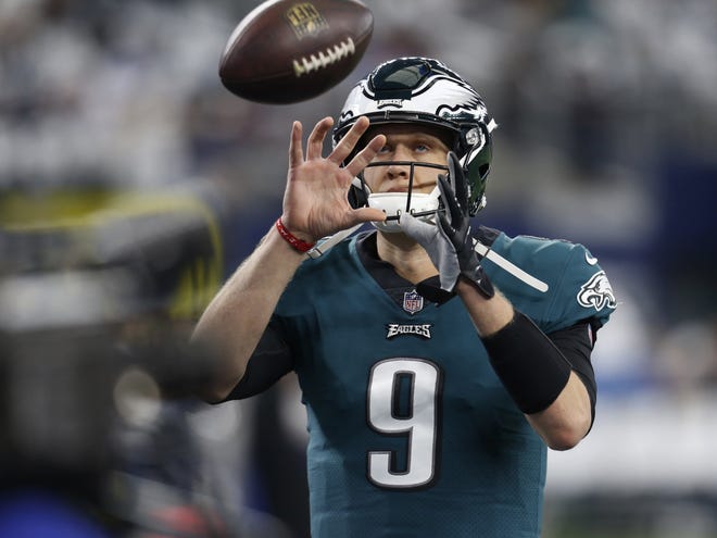 Philadelphia Eagles quarterback Nick Foles, who came off the bench to spark his team's run to the Super Bowl title last season, is back as the starter in place of the injured Carson Wentz. [ROGER STEINMAN/THE ASSOCIATED PRESS]