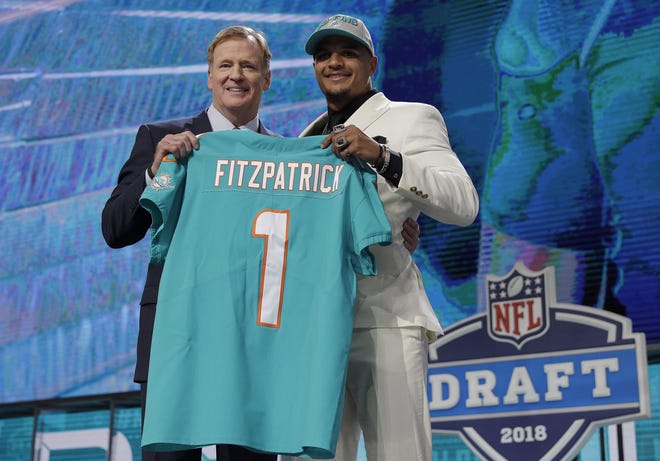 Commissioner Roger Goodell, left, poses with Alabama's Minkah Fitzpatrick after the former Crimson Tide safety was selected by the Miami Dolphins during the first round of the NFL Draft in Arlington, Texas. [AP file]