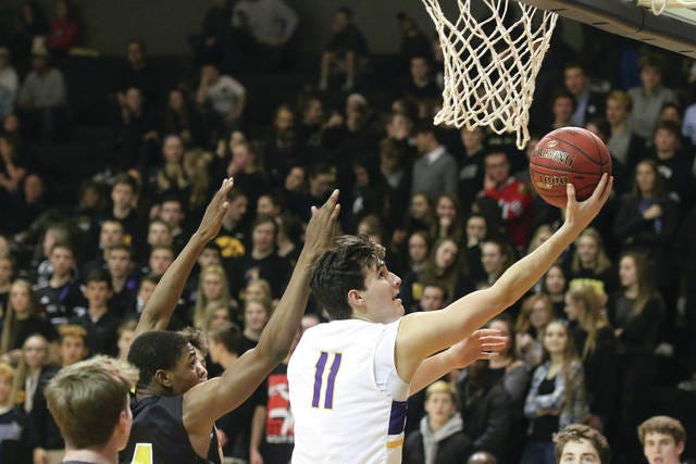 Waukee senior Noah Hart going in for the score against Southeast Polk on Friday, December 21. PHOTO BY ANDREW BROWN/DALLAS COUNTY NEWS