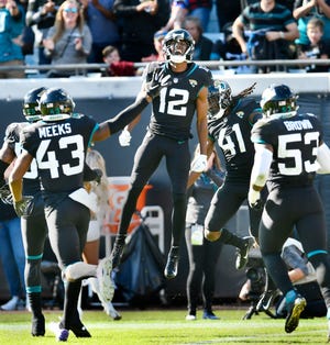 Jacksonville Jaguars wide receiver Dede Westbrook (12) celebrates with teammates after scoring a touchdown on a punt return against the Washington Redskins Sunday, December 16, 2018 at TIAA Bank Field in Jacksonville, Florida. Washington won 16-13. [Will Dickey/Florida Times-Union]