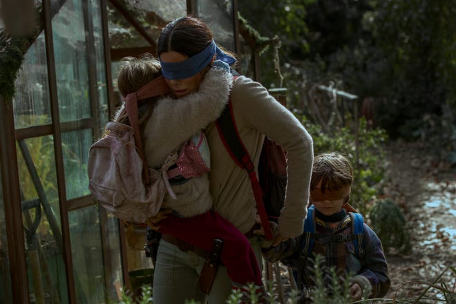 Vivien Lyra Blair, Sandra Bullock and Julian Edwards

 in a scene from "Bird Box."Photo credit: Netflix