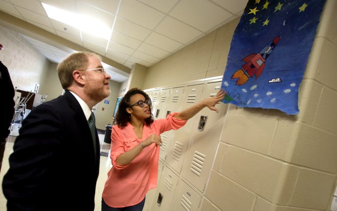 State Community College President Peter Hans, left, takes a tour of Cleveland Community College on Thursday. [Brittany Randolph/The Star]
