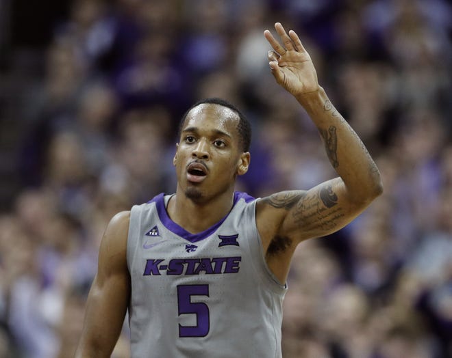 Kansas State's Barry Brown Jr. celebrates after making a basket during the first half of an NCAA college basketball game against Vanderbilt Saturday, Dec. 22, 2018, at the Sprint Center in Kansas City, Mo. (AP Photo/Charlie Riedel)