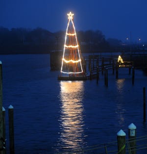 Christmas decorations on Bass River in South Yarmouth in a 2015 file photo evokes the spirit of the holiday.

[Ron Schloerb/Cape Cod Times file]