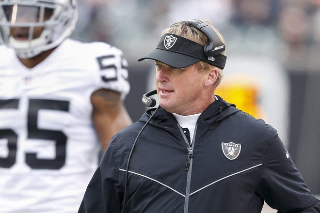 Oakland Raiders head coach Jon Gruden works the sideline in the first half of an NFL football game against the Cincinnati Bengals Dec. 16 in Cincinnati. The Oakland Coliseum might finally be hosting its final NFL game on Monday night when Oakland (3-11) hosts the Denver Broncos (6-8). The Raiders are set to move to Las Vegas in 2020 where they will play a new $1.8 billion, 65,000-seat stadium that will make the Coliseum look like a relic. The franchise is still looking for a home in 2019. [GARY LANDERS/ASSOCIATED PRESS]