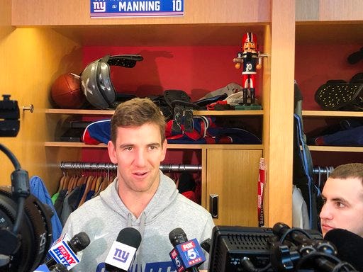 With questions about his future swirling, New York Giants quarterback Eli Manning said Wednesday, Dec. 26, 2018, in East Rutherford, N.J., that he is concentrating on Sunday’s game at MetLife Stadium against the Dallas Cowboys. The 37-year-old two time Super Bowl MVP winner is finishing his 15th season. (AP Photo/Tom Canavan)