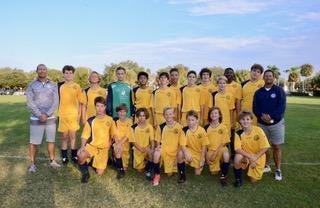 Members of Palm Beach Day Academy's champion soccer team. The Bulldogs went 11-0-1 this season. [Courtesy of the school]