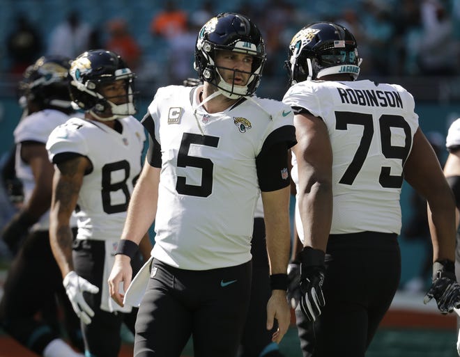 Jacksonville Jaguars quarterback Blake Bortles (5) warms up, before a game against the Miami Dolphins on Sunday in Miami Gardens. [AP Photo/Lynne Sladky, File]