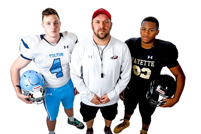 From left, Tolton's Connor Fogue, Southern Boone head coach Trent Tracy and Fayette's Isaiah Estes pose for a portrait at the Tribune on Thursday, Dec. 20. [Hunter Dyke/Tribune]