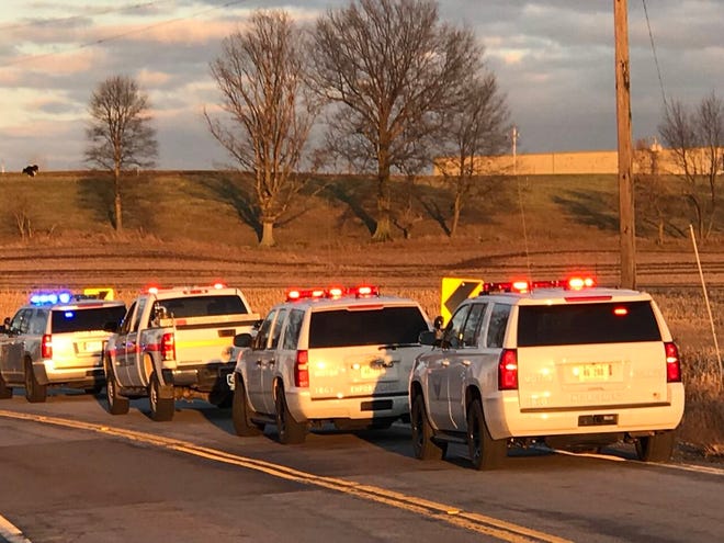 Emergency vehicles lined up at the scene of fatal accident on Ohio 585 near Fox Lake Road.