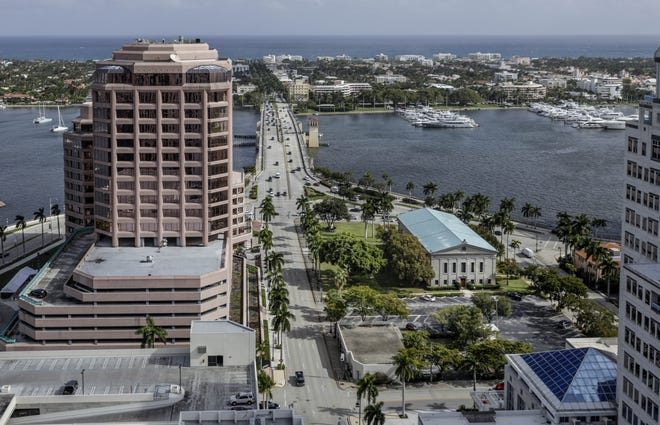 A judge has ruled in favor of the establishment of the Okeechobee Business District that includes a 25-story Class A office building near the First Church of Christ Scientist, bottom right, on Thursday in West Palm Beach. [GREG LOVETT/palmbeachpost.com]