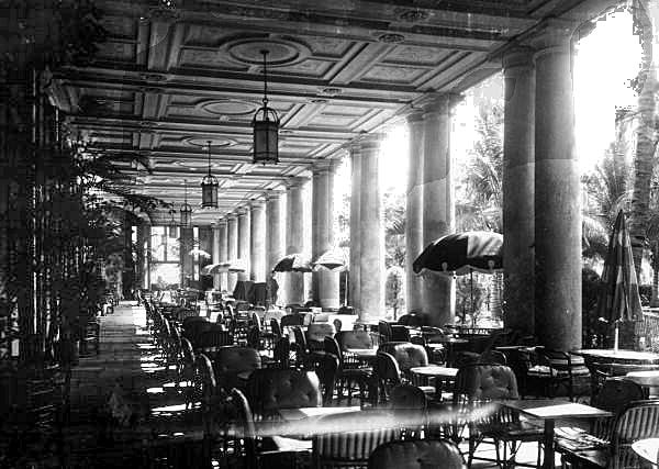 The Breakers' main loggia, pictured here in 1938, was a place to relax on New Year's Eve when guests weren't dancing in the resort's new Cocoanut Grove, modeled after the original grove at the Royal Poinciana Hotel, which was razed (in phases) by 1937. [Courtesy Florida Memory]