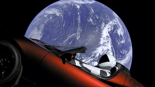 This was the year that SpaceX founder Elon Musk sent a cherry red Tesla roadster into orbit beyond Mars, with the car carried on his Falcon Heavy rocket. [SpaceX via The Associated Press]