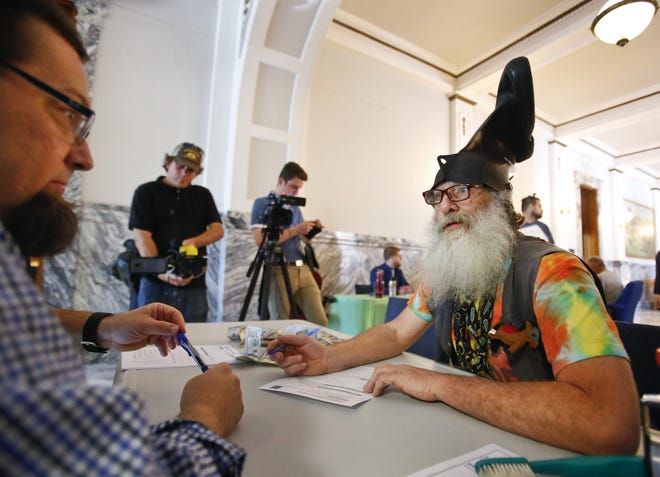 Vermin Supreme files as a candidate for Kansas attorney general at Memorial Hall in downtown Topeka. [June 2018 file photo/The Capital-Journal]