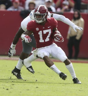 Alabama wide receiver Jaylen Waddle (17) makes a move on a The Citadel defender during Alabama's 50-17 win over The Citadel in Bryant-Denny Stadium, Nov. 17, 2018. [Staff Photo/Gary Cosby Jr.]