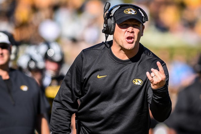 Missouri head coach Barry Odom yells to the referee during the Tigers' homecoming game at Memorial Stadium on Saturday, Oct. 20. [Hunter Dyke/Tribune]