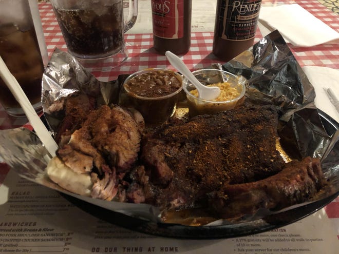 Pictured is a combination of ribs and brisket from Rendezvous in Memphis, Tenn. [Garrick Hodge/Tribune]