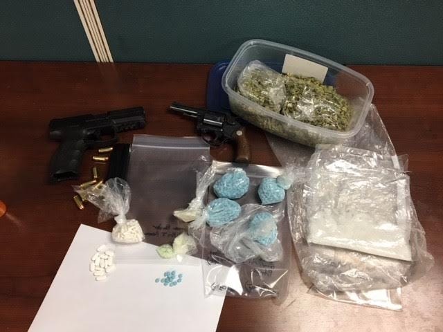 Okaloosa County Sheriff's Office deputies found these guns and drugs while executing a search warrant at a home on Oak Street this morning. [OCSO/CONTRIBUTED PHOTO]