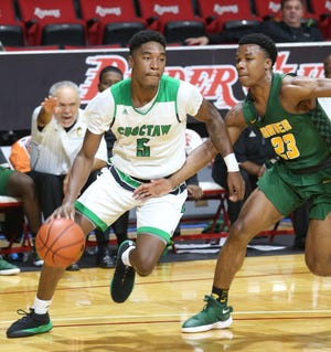Choctaw drives to the hoop against George Washington Carver during the EC16 basketball tournament at The Arena. [MICHAEL SNYDER/DAILY NEWS]