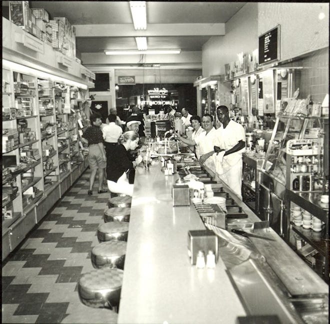 The counter at Green's Luncheonette has been a favorite dining spot for island residents, visitors and workers for many years. [Courtesy Historical Society of Palm Beach County]