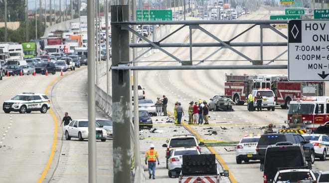 Police investigate a series of crashes and the fatal shooting of a murder suspect by a PBSO deputy on northbound I-95 north of Lantana Road in February, 2018. Authorities say Hugo Selva killed two people before being fatally shot by a deputy [LANNIS WATERS/palmbeachpost.com]