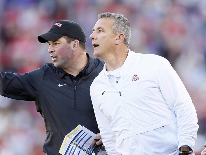 Ohio State Buckeyes head coach Urban Meyer and offensive coordinator Ryan Day yell from the sideline during the second quarter of the Rose Bowl in Pasadena, Calif. on Jan. 1, 2019. [Adam Cairns/Dispatch]