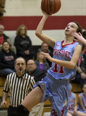 Lewistown's Bailee Mayberry skies for a layup during a game against Stark County earlier this season. [STEVE DAVIS/WCI Sports]