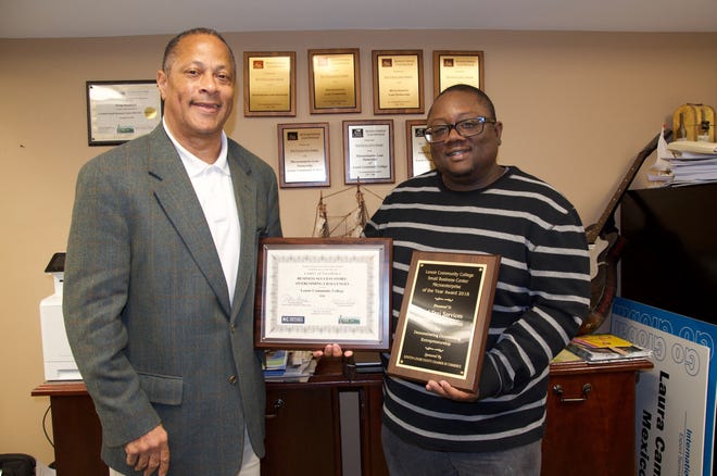 Lenoir Community College Small Business Center and its director Gregor Hannibal were recently recognized by the the North Carolina Community College System Small Business Center Network. Pictured left to right are Lenoir Community College Small Business Director Gregor Hannibal and Alton “Bud” Cannon. [Contributed photo]