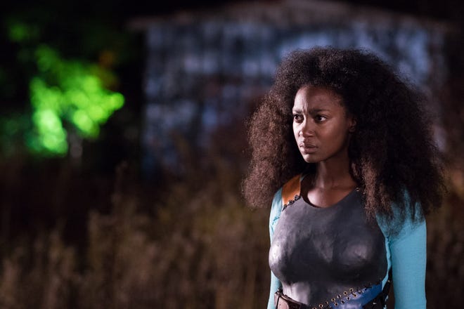 Ti-Jeanne (Mouna Traoré) wears a power-controlling vest in a scene from "Brown Girl Begins." (Photo Credit: Brendan Adam-Zwelling)