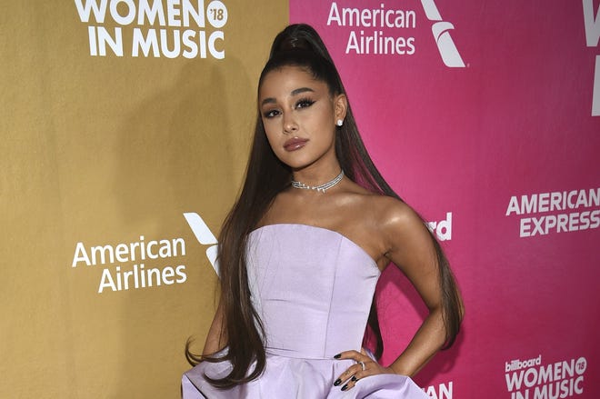 FILE - In a Thursday, Dec. 6, 2018 file photo, Ariana Grande attends the 13th annual Billboard Women in Music event at Pier 36, in New York. Ariana Grande has cancelled a Las Vegas performance scheduled for Saturday, Dec. 29, 2018 "due to unforeseeable health reasons.þÄù(Photo by Evan Agostini/Invision/AP, File)